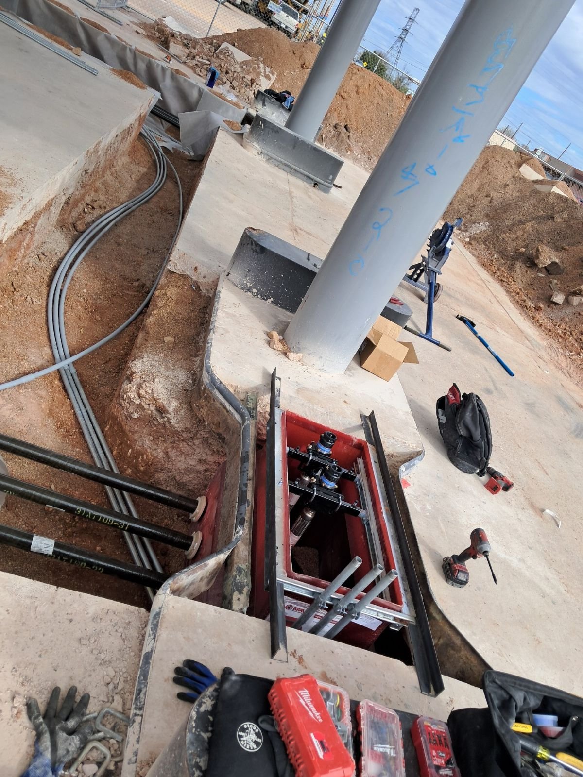 Electrical pull box and conduit stub-ups at a new commercial build